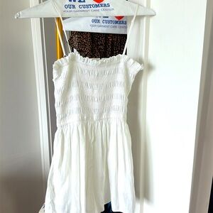 Beautiful white romper from Altered State size small
